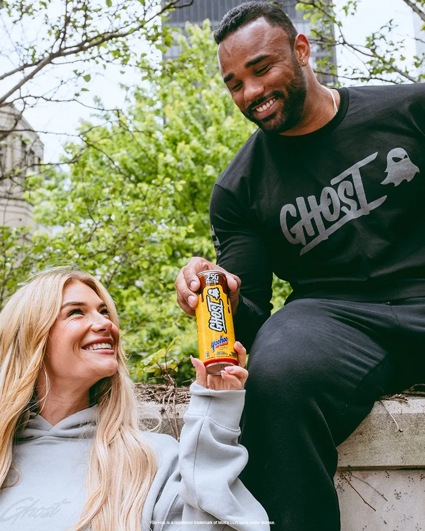 Ghost Yoo-hoo protein drink with two people outdoors
